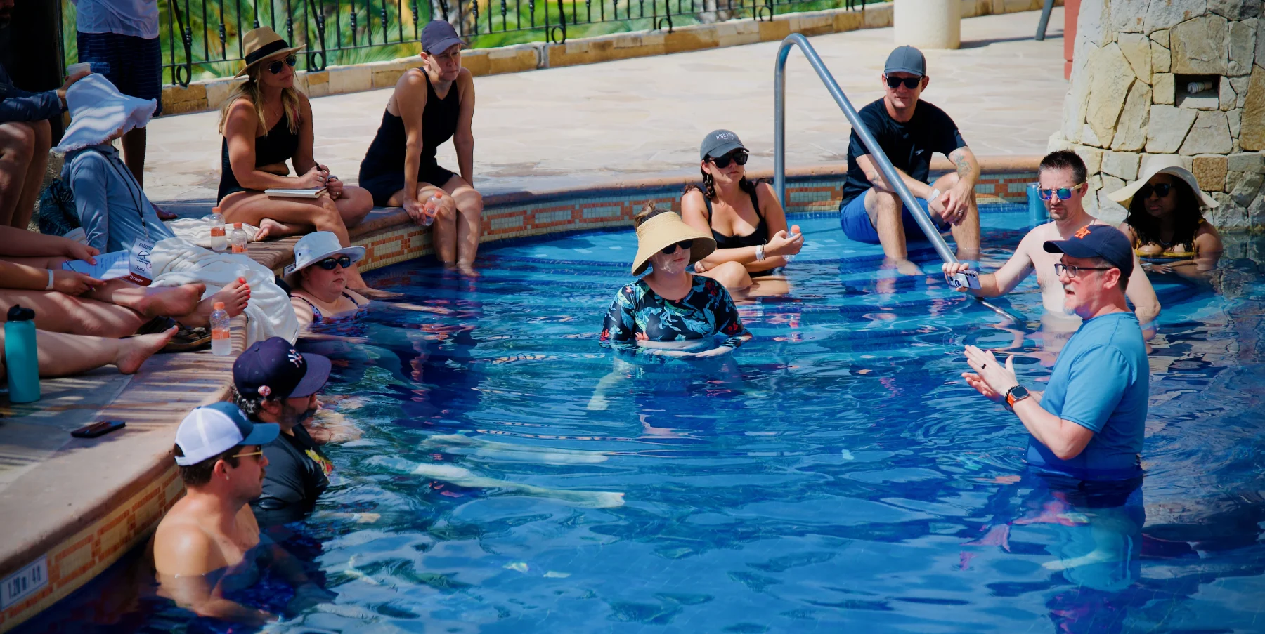 Shawn speaking at the one-of-a-kind business event where all the sessions take place in a pool — CaboPress.